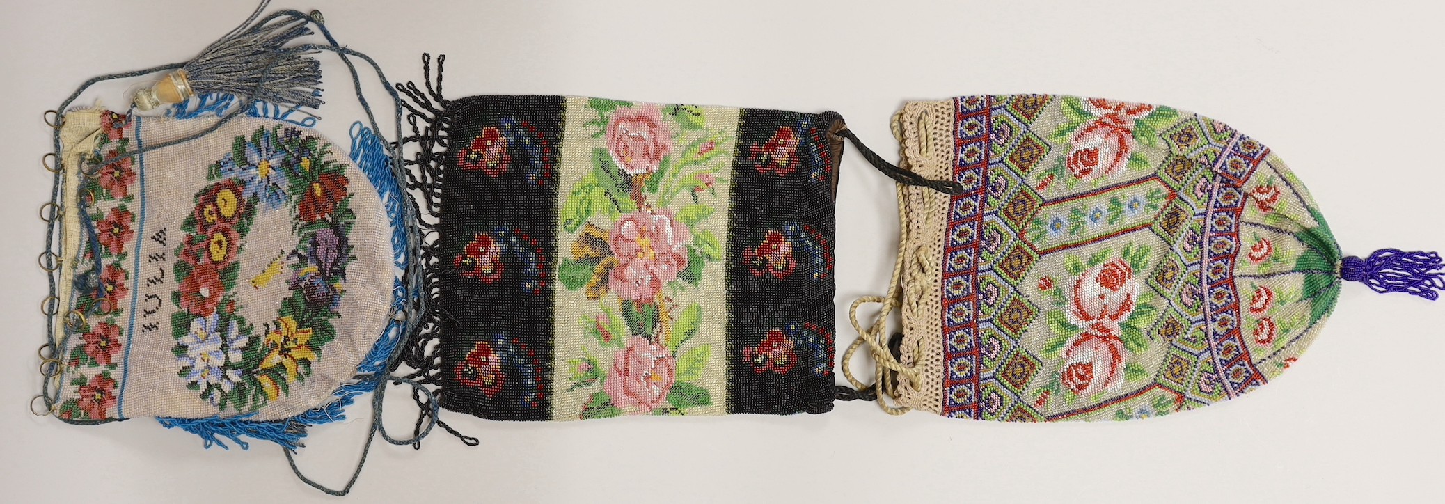 Three 19th century finely bead-worked draw string bags